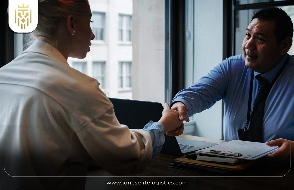 Image of two parties agreeing on a delivery deal | JEL